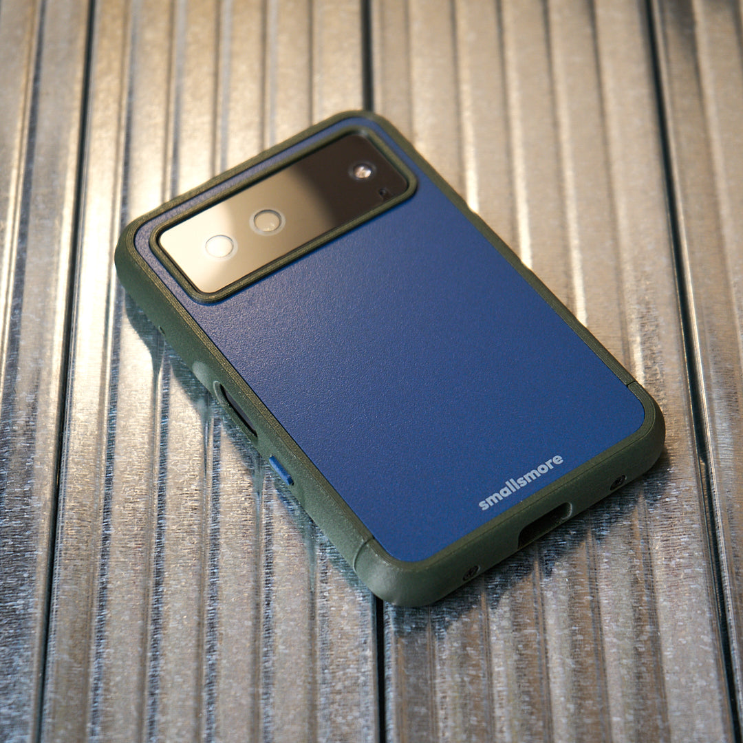 Olive frame and blue backplate on a metal desk